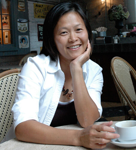 Christina Blackley sitting a cafe